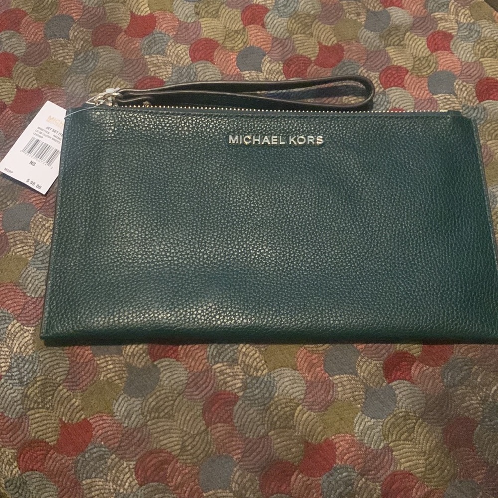 MK JetSet large zip clutch